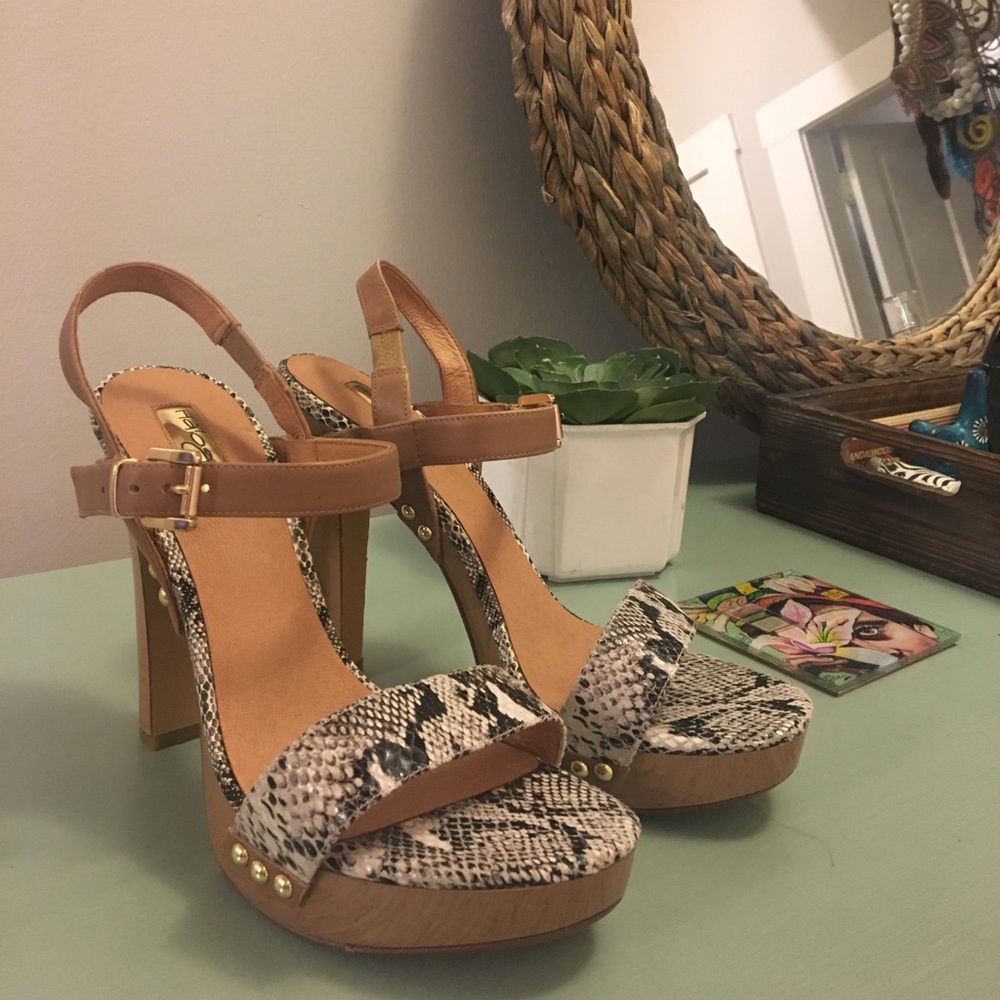 Black and white snake skin and wooden heels
